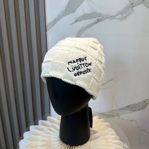 Louis Vuitton women’s hats black white
